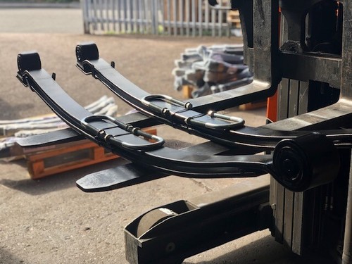 Pair rear leaf hd springs - of,